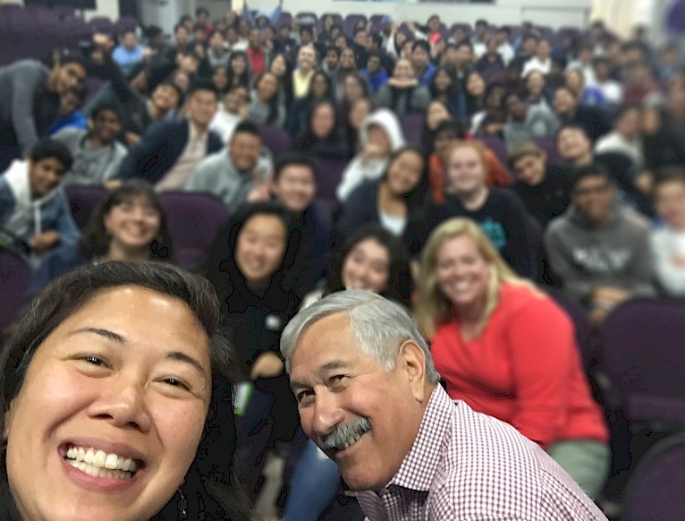 Professors Camarillo and Choy taking a selfie with their audience