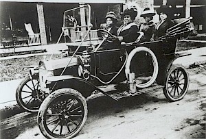 Madam C. J. Walker drives a car in 1911 with three female presenting friends