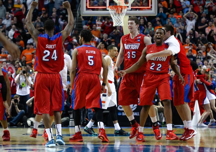 The 2014 University of Dayton basketball team celebrating