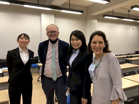 OAH members Farina King and Erik Loomis standing with students of a Japanese university
