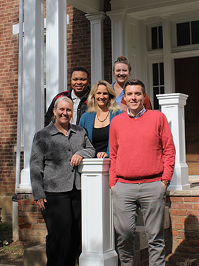 New staff standing in front of the OAH office
