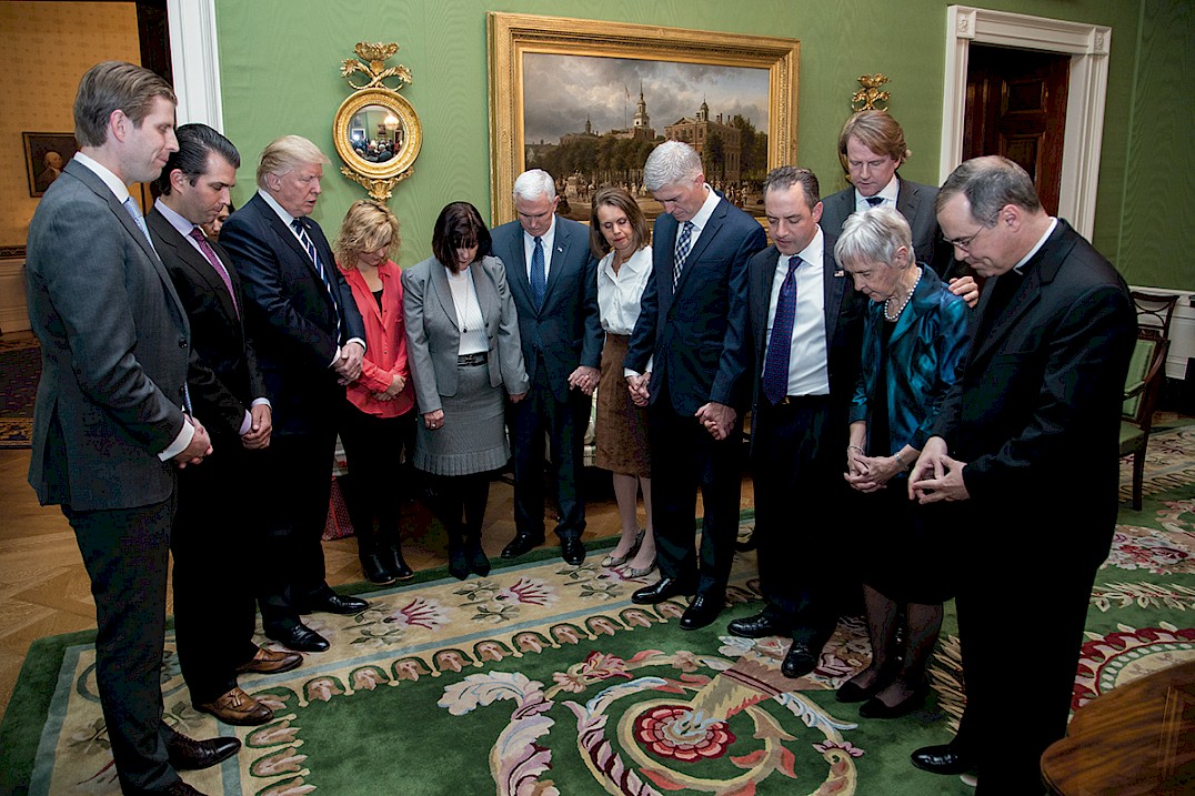 President Donald J. Trump, Vice President Mike Pence, and others pray with Neil Gorsuch after Gorsuch's nomination to the Supreme Court